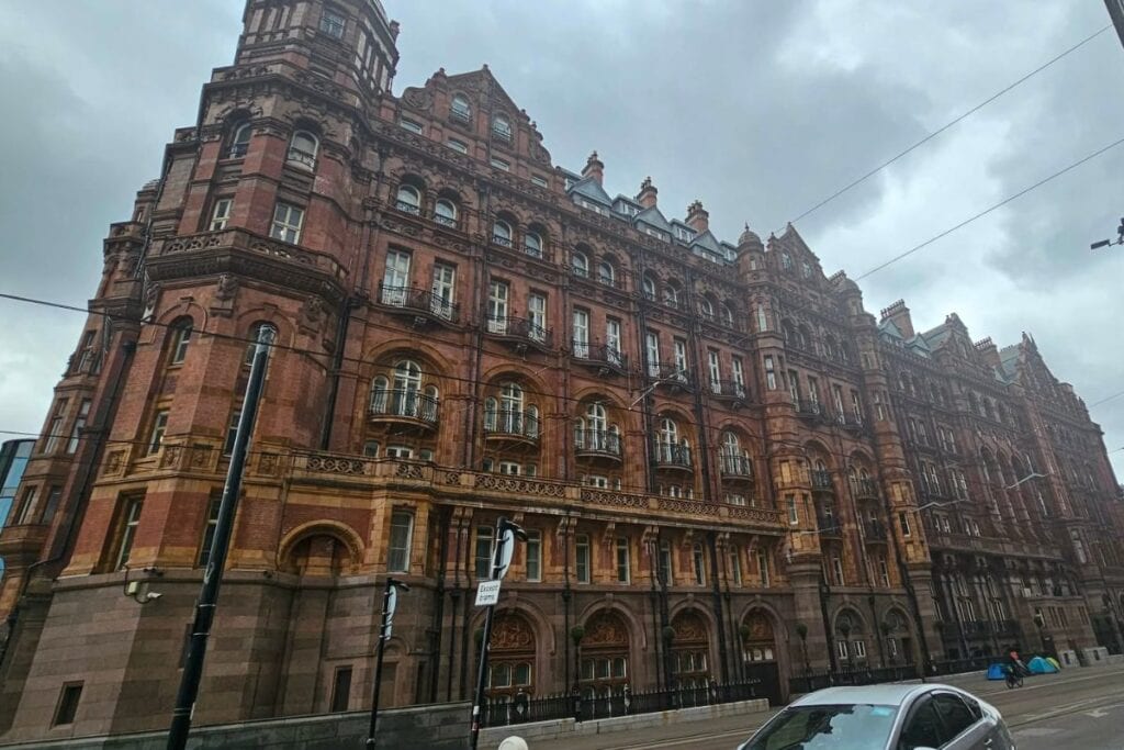 The Midland Hotel Manchester exterior on Peter Street under a cloudy sky